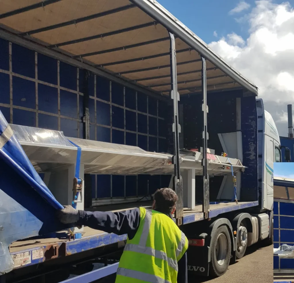 ProCut cross cut saw being unloaded from lorry at IM Export Services.