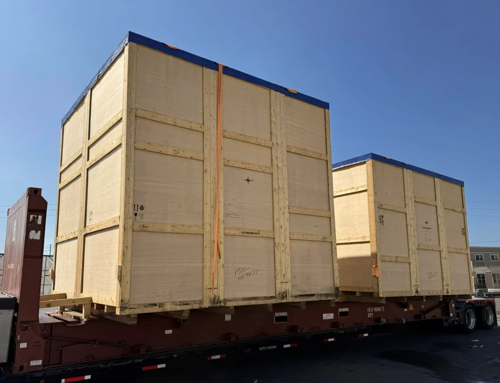 Wind tunnel sections packed in large timber cases for transport